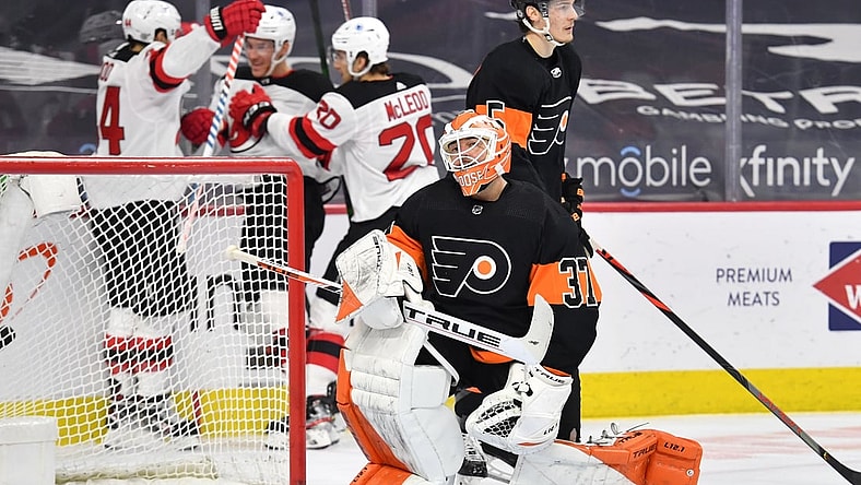Apr 25, 2021; Philadelphia, Pennsylvania, USA; Philadelphia Flyers goaltender Brian Elliott (37) reacts after allowing a goal by New Jersey Devils left wing Miles Wood (44) during the second period at Wells Fargo Center. Mandatory Credit: Eric Hartline-USA TODAY Sports
