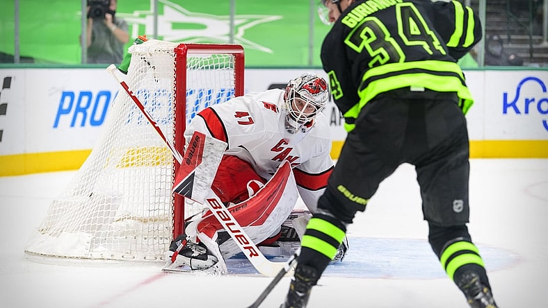 Apr 26, 2021; Dallas, Texas, USA; Carolina Hurricanes goaltender James Reimer (47) faces a shot by Dallas Stars right wing Denis Gurianov (34) during the second period at the American Airlines Center. Mandatory Credit: Jerome Miron-USA TODAY Sports