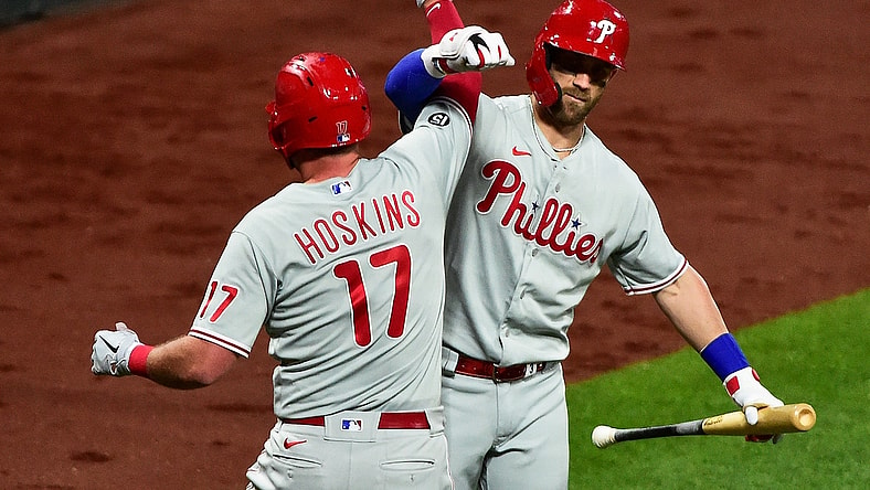 Apr 26, 2021; St. Louis, Missouri, USA;  Philadelphia Phillies first baseman Rhys Hoskins (17) celebrates with right fielder Bryce Harper (3) after hitting a solo home run off of St. Louis Cardinals starting pitcher Adam Wainwright (not pictured) during the seventh inning at Busch Stadium. Mandatory Credit: Jeff Curry-USA TODAY Sports