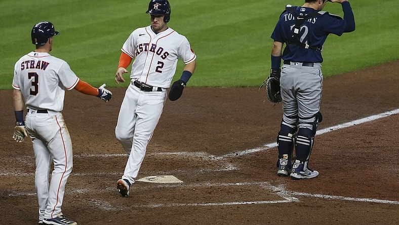 Apr 26, 2021; Houston, Texas, USA; Houston Astros center fielder Myles Straw (3) congratulates third baseman Alex Bregman (2) for scoring against the Seattle Mariners in the fifth inning at Minute Maid Park. Mandatory Credit: Thomas Shea-USA TODAY Sports