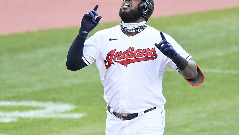 Apr 27, 2021; Cleveland, Ohio, USA; Cleveland Indians designated hitter Franmil Reyes (32) celebrates his solo home run in the second inning against the Minnesota Twins at Progressive Field. Mandatory Credit: David Richard-USA TODAY Sports
