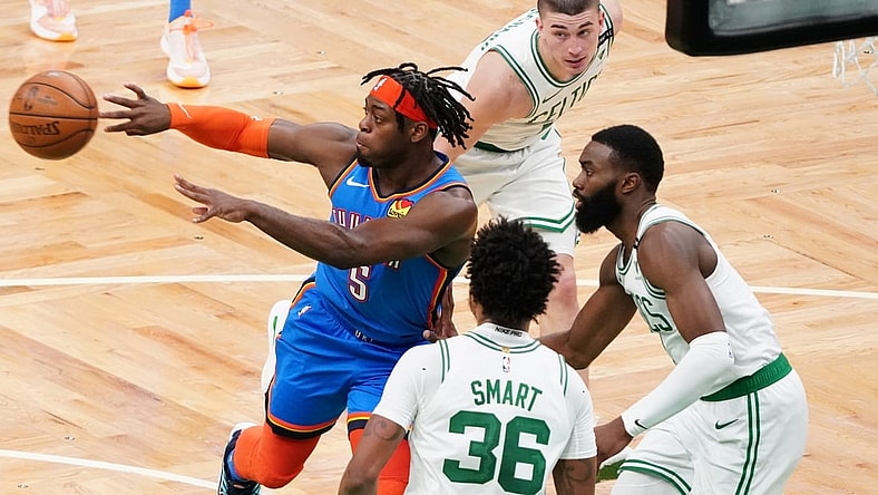 Apr 27, 2021; Boston, Massachusetts, USA; Oklahoma City Thunder forward Luguentz Dort (5) passes the ball against the Boston Celtics in the second quarter at TD Garden. Mandatory Credit: David Butler II-USA TODAY Sports