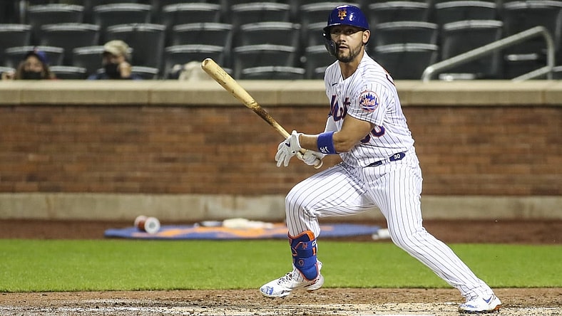 Apr 27, 2021; New York City, New York, USA; New York Mets right fielder Michael Conforto (30) watches his double during the fourth inning against the Boston Red Sox at Citi Field. Mandatory Credit: Wendell Cruz-USA TODAY Sports