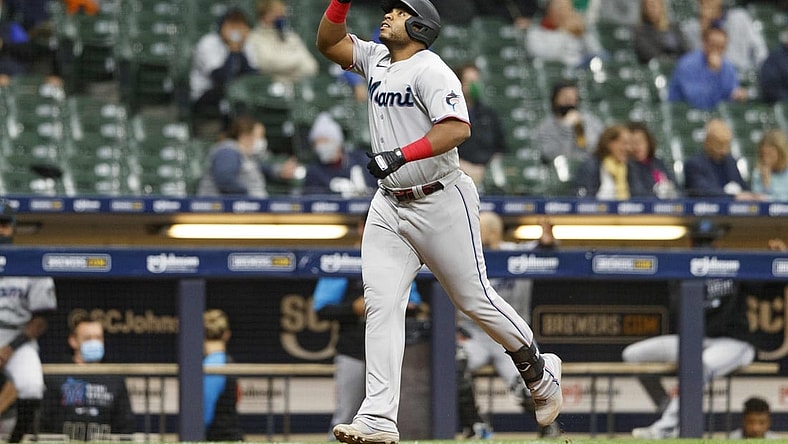 Apr 27, 2021; Milwaukee, Wisconsin, USA;  Miami Marlins first baseman Jes s Aguilar (24) celebrates after hitting a home run during the fourth inning against the Milwaukee Brewers at American Family Field. Mandatory Credit: Jeff Hanisch-USA TODAY Sports