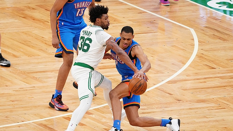Apr 27, 2021; Boston, Massachusetts, USA; Boston Celtics guard Marcus Smart (36) strips the ball from Oklahoma City Thunder forward Darius Bazley (7) in the third quarter at TD Garden. Mandatory Credit: David Butler II-USA TODAY Sports