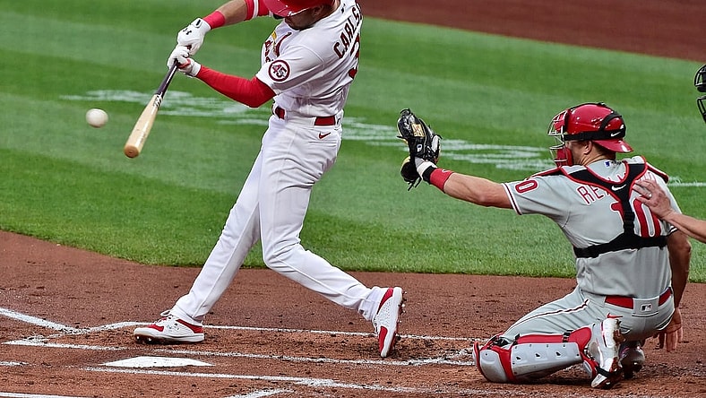 Apr 27, 2021; St. Louis, Missouri, USA;  St. Louis Cardinals center fielder Dylan Carlson (3) hits a double during the first inning against the Philadelphia Phillies at Busch Stadium. Mandatory Credit: Jeff Curry-USA TODAY Sports