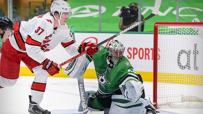 Apr 27, 2021; Dallas, Texas, USA; Dallas Stars goaltender Anton Khudobin (35) defends the goal against Carolina Hurricanes right wing Andrei Svechnikov (37) during the second period at the American Airlines Center. Mandatory Credit: Jerome Miron-USA TODAY Sports