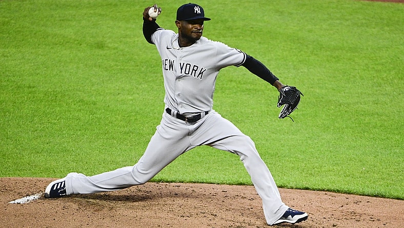 Apr 28, 2021; Baltimore, Maryland, USA;  New York Yankees starting pitcher Domingo German (55) delivers a pitch during the second inning against the Baltimore Orioles at Oriole Park at Camden Yards. Mandatory Credit: Tommy Gilligan-USA TODAY Sports