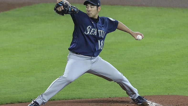 Apr 29, 2021; Houston, Texas, USA; Seattle Mariners starting pitcher Yusei Kikuchi (18) pitches against the Houston Astros in the first inning at Minute Maid Park. Mandatory Credit: Thomas Shea-USA TODAY Sports