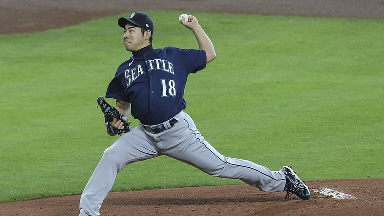 Apr 29, 2021; Houston, Texas, USA; Seattle Mariners starting pitcher Yusei Kikuchi (18) pitches against the Houston Astros in the first inning at Minute Maid Park. Mandatory Credit: Thomas Shea-USA TODAY Sports