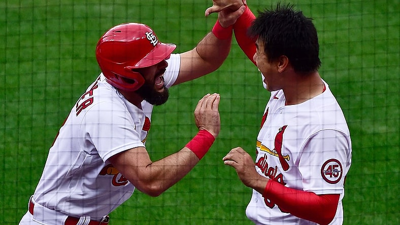 Apr 29, 2021; St. Louis, Missouri, USA;  St. Louis Cardinals pinch hitter Matt Carpenter (13) is congratulated by starting pitcher Kwang Hyun Kim (33) after hitting a three run home run during the fifth inning against the Philadelphia Phillies at Busch Stadium. Mandatory Credit: Jeff Curry-USA TODAY Sports