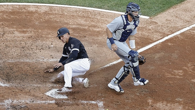 Apr 29, 2021; Chicago, Illinois, USA; Chicago White Sox third baseman Jake Lamb (23) scores against the Detroit Tigers during the fifth inning of the first game of a doubleheader at Guaranteed Rate Field. Mandatory Credit: Kamil Krzaczynski-USA TODAY Sports