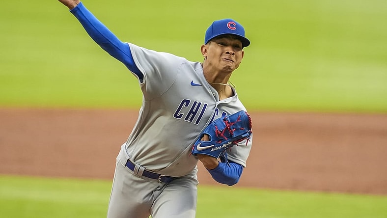 Apr 29, 2021; Cumberland, Georgia, USA; Chicago Cubs starting pitcher Adbert Alzolay (73) pitches against the Atlanta Braves during the first inning at Truist Park. Mandatory Credit: Dale Zanine-USA TODAY Sports