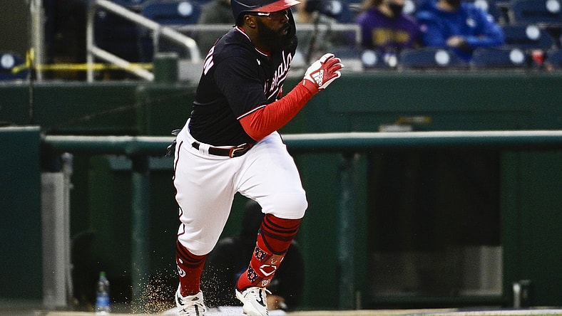 Apr 30, 2021; Washington, District of Columbia, USA;  Washington Nationals second baseman Josh Harrison (5) singles during the first inning against the Miami Marlins at Nationals Park. Mandatory Credit: Tommy Gilligan-USA TODAY Sports