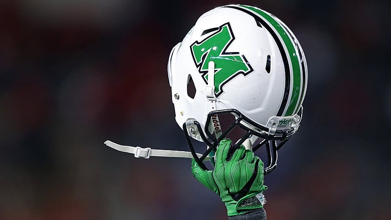 Sep 30, 2017; Cincinnati, OH, USA; A player of the Marshall Thundering Herd holds his helmet to celebrate the touchdown by tight end Ryan Yurachek (not pictured) against the Cincinnati Bearcats in the second half at Nippert Stadium. Mandatory Credit: Aaron Doster-USA TODAY Sports