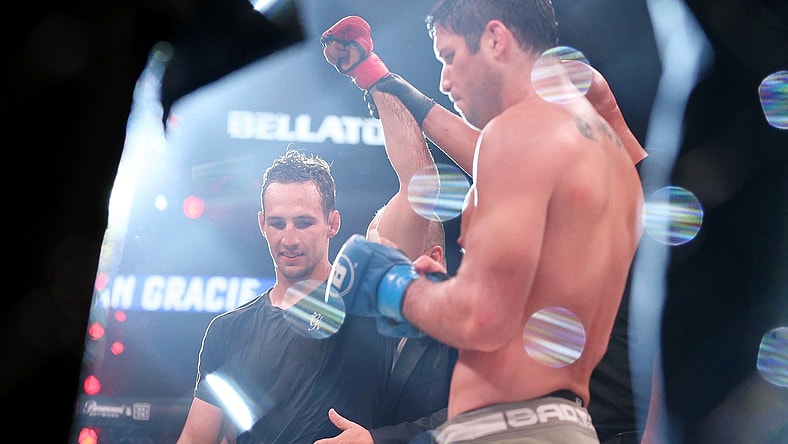 Jun 14, 2019; New York, NY, USA; Rory MacDonald (red gloves) after his win over Neiman Gracie (blue gloves) during Bellator 222 at Madison Square Garden. MacDonald won the fight. Mandatory Credit: Ed Mulholland-USA TODAY Sports
