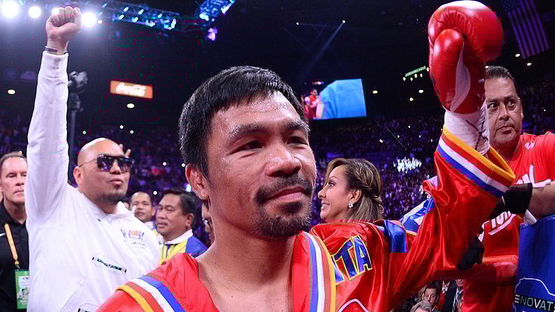 Jul 20, 2019; Las Vegas, NV, USA; Manny Pacquiao enters the ring to face Keith Thurman (not pictured) for their WBA welterweight championship bout at MGM Grand Garden Arena. Pacquiao won via split decision. Mandatory Credit: Joe Camporeale-USA TODAY Sports