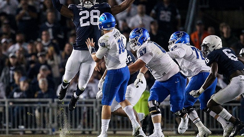 Sep 7, 2019; University Park, PA, USA; Penn State Nittany Lions defensive end Jayson Oweh (28) pressures Buffalo Bulls quarterback Matt Myers (10) during the third quarter at Beaver Stadium. Penn State defeated Buffalo 45-13. Mandatory Credit: Matthew O'Haren-USA TODAY Sports