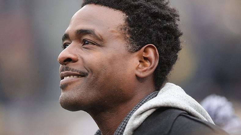 Chris Webber watches the Michigan Wolverines warm up before action against the Ohio State Buckeyes Saturday, November 30, 2019 at Michigan Stadium in Ann Arbor, Mich.

Michigan Football