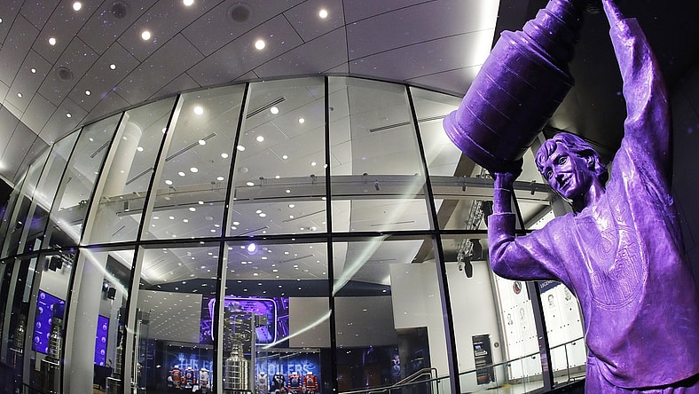 Mar 13, 2020; Edmonton, Alberta, CAN; The statue of Wayne Gretzky watches over an empty Rogers Place as the NHL suspends games because of the COVID-19 outbreak at Rogers Place. Mandatory Credit: Perry Nelson-USA TODAY Sports