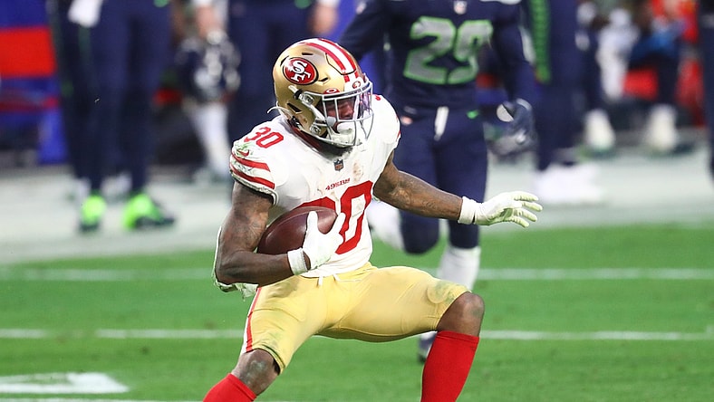 Jan 3, 2021; Glendale, Arizona, USA; San Francisco 49ers running back Jeff Wilson Jr. (30) against the Seattle Seahawks at State Farm Stadium. Mandatory Credit: Mark J. Rebilas-USA TODAY Sports