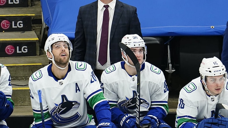 Feb 4, 2021; Toronto, Ontario, CAN; Vancouver Canucks head coach Travis Green looks up at the scoreboard during the third period against the Toronto Maple Leafs at Scotiabank Arena. Toronto defeated Vancouver. Mandatory Credit: John E. Sokolowski-USA TODAY Sports