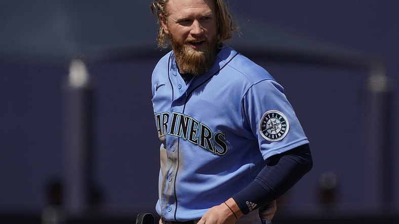 Mar 21, 2021; Phoenix, Arizona, USA; Seattle Mariners center fielder Jake Fraley (28) reacts after hitting a double against the Milwaukee Brewers during a spring training game at American Family Fields of Phoenix. Mandatory Credit: Rick Scuteri-USA TODAY Sports