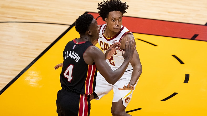 Apr 3, 2021; Miami, Florida, USA; Cleveland Cavaliers guard Collin Sexton (2) plays defense against Miami Heat guard Victor Oladipo (4) during the first of a game at American Airlines Arena. Mandatory Credit: Mary Holt-USA TODAY Sports