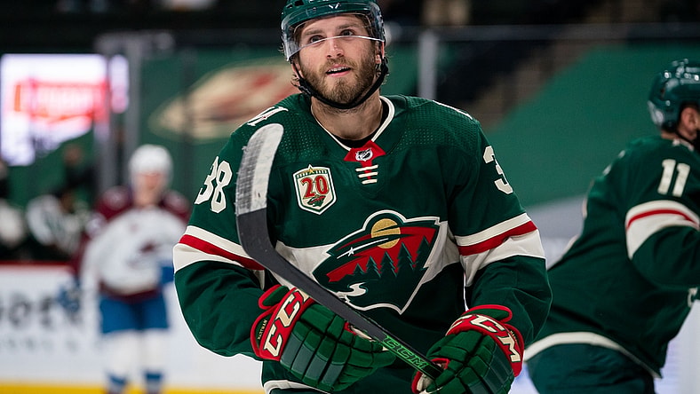 Apr 7, 2021; Saint Paul, Minnesota, USA;  Minnesota Wild forward Ryan Hartman (38) celebrates his goal against the Colorado Avalanche in the second period at Xcel Energy Center. Mandatory Credit: Brad Rempel-USA TODAY Sports