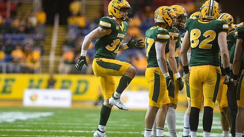 North Dakota State kicker Nathan Whiting warms up his leg during a huddle in the Dakota Marker rivalry game on Saturday, April 17, 2021, at the Fargodome in Fargo.

Dakota Marker 015