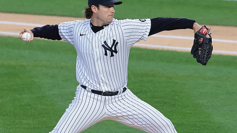 Apr 30, 2021; Bronx, New York, USA; New York Yankees starting pitcher Gerrit Cole (45) delivers a pitch during the first inning against the Detroit Tigers at Yankee Stadium. Mandatory Credit: Vincent Carchietta-USA TODAY Sports