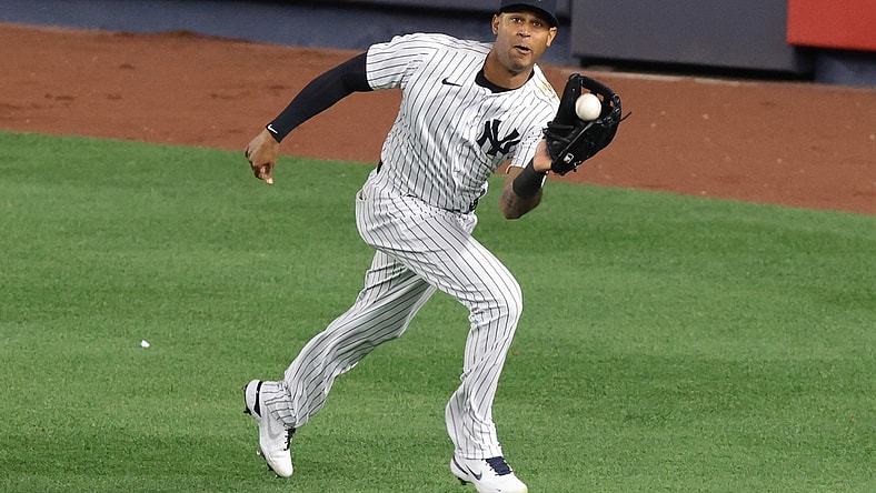 Apr 30, 2021; Bronx, New York, USA; New York Yankees center fielder Aaron Hicks (31) catches the ball for an out during the eighth inning against the Detroit Tigers at Yankee Stadium. Mandatory Credit: Vincent Carchietta-USA TODAY Sports