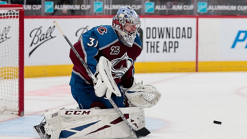 Apr 30, 2021; Denver, Colorado, USA; Colorado Avalanche goaltender Philipp Grubauer (31) makes a save in the second period against the San Jose Sharks at Ball Arena. Mandatory Credit: Isaiah J. Downing-USA TODAY Sports