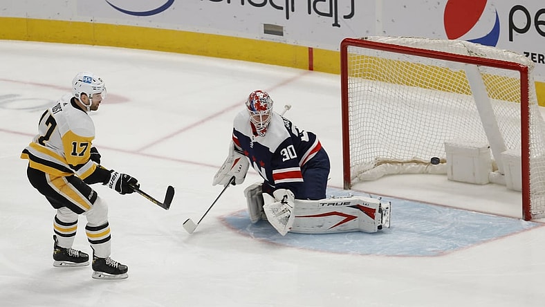 May 1, 2021; Washington, District of Columbia, USA; Pittsburgh Penguins right wing Bryan Rust (17) scores a goal on Washington Capitals goaltender Ilya Samsonov (30) in the first period at Capital One Arena. Mandatory Credit: Geoff Burke-USA TODAY Sports