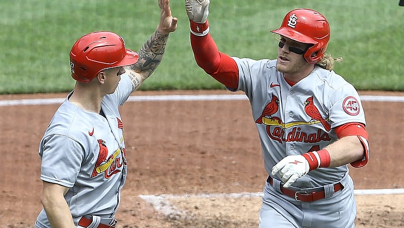 May 2, 2021; Pittsburgh, Pennsylvania, USA;  St. Louis Cardinals left fielder Tyler O'Neill (left) high fives center fielder Harrison Bader (48) after Bader hit a three run home run against the Pittsburgh Pirates during the second inning at PNC Park. Mandatory Credit: Charles LeClaire-USA TODAY Sports