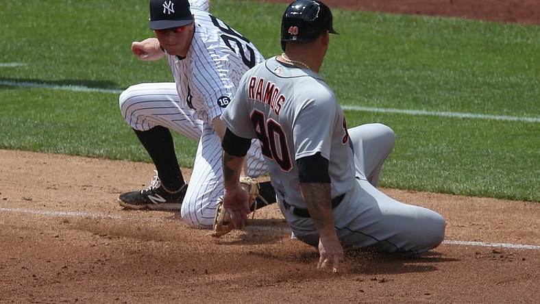 May 2, 2021; Bronx, New York, USA; Detroit Tigers catcher Wilson Ramos (40) takes third base ahead of a tag by New York Yankees third baseman DJ LeMahieu (26) on a wild pitch by Yankees starting pitcher Corey Kluber (not pictured) during the third inning at Yankee Stadium. Mandatory Credit: Brad Penner-USA TODAY Sports