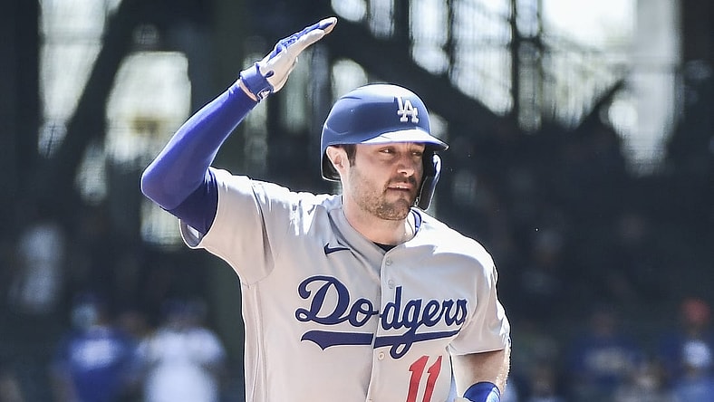 May 2, 2021; Milwaukee, Wisconsin, USA; Los Angeles Dodgers left fielder AJ Pollock (11) reacts as he runs the bases after hitting a grand slam home run in the first inning against the Milwaukee Brewers at American Family Field. Mandatory Credit: Benny Sieu-USA TODAY Sports