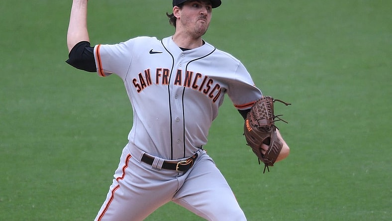 May 2, 2021; San Diego, California, USA; San Francisco Giants starting pitcher Kevin Gausman (34) pitches against the San Diego Padres during the fifth inning at Petco Park. Mandatory Credit: Orlando Ramirez-USA TODAY Sports