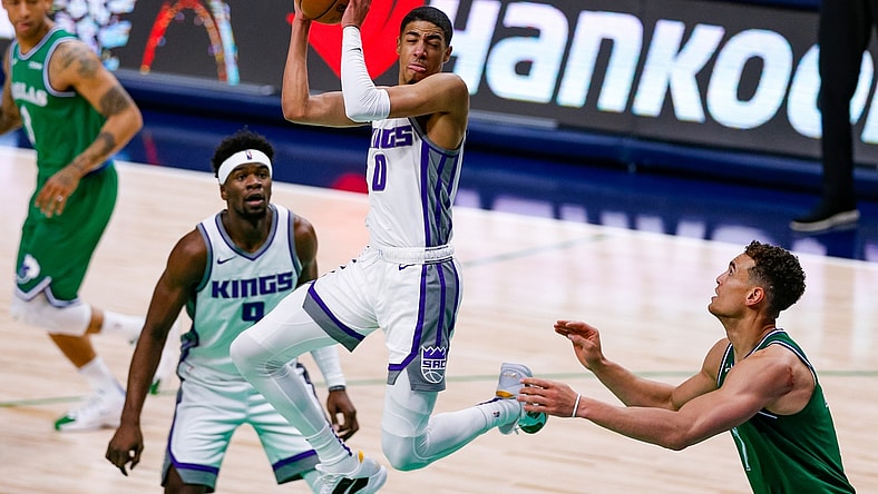 May 2, 2021; Dallas, Texas, USA; Sacramento Kings guard Tyrese Haliburton (0) grabs a rebound during the second quarter against the Dallas Mavericks at American Airlines Center. Mandatory Credit: Andrew Dieb-USA TODAY Sports