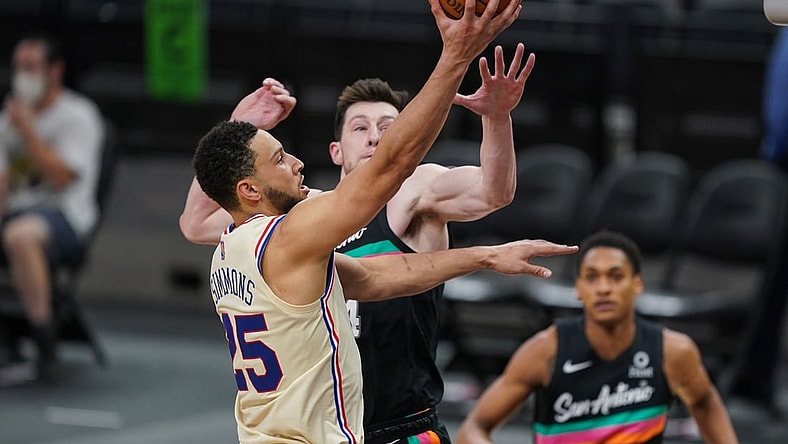 May 2, 2021; San Antonio, Texas, USA;  Philadelphia 76ers guard Ben Simmons (25) shoots over San Antonio Spurs forward Drew Eubanks (14) in the second half at the AT&T Center. Mandatory Credit: Daniel Dunn-USA TODAY Sports