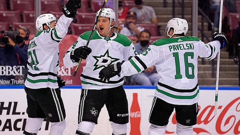 May 3, 2021; Sunrise, Florida, USA; Dallas Stars left wing Jason Robertson (21) celebrates his goal against the Florida Panthers with left wing Roope Hintz (24) and center Joe Pavelski (16) during the first period at BB&T Center. Mandatory Credit: Jasen Vinlove-USA TODAY Sports