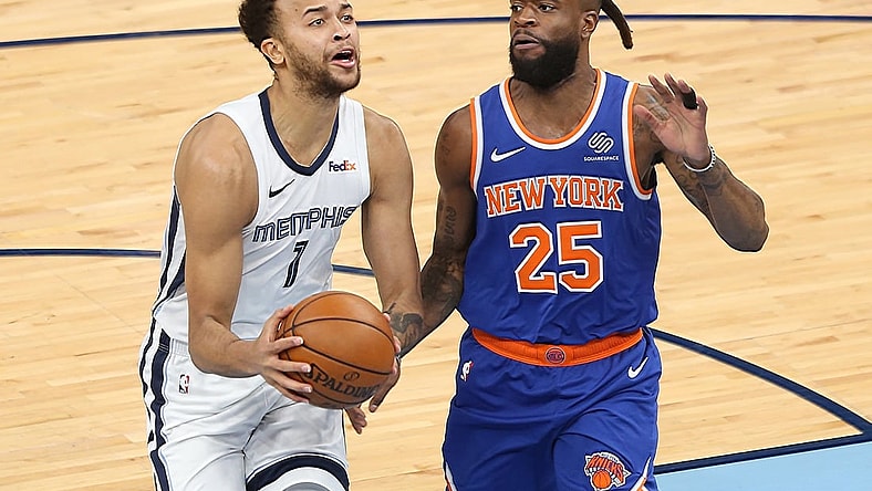 May 3, 2021; Memphis, Tennessee, USA; Memphis Grizzlies forward Kyle Anderson (1) drives against New York Knicks forward Reggie Bullock (25) during the first quarter at FedExForum. Mandatory Credit: Nelson Chenault-USA TODAY Sports