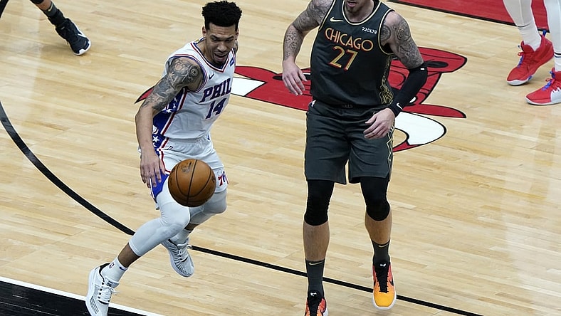 May 3, 2021; Chicago, Illinois, USA; Philadelphia 76ers forward Danny Green (14) attempts to save a loose ball from going out against Chicago Bulls center Daniel Theis (27) during the first quarter at the United Center. Mandatory Credit: Mike Dinovo-USA TODAY Sports