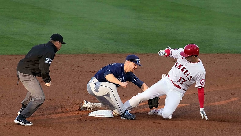 May 3, 2021; Anaheim, California, USA; Los Angeles Angels designated hitter Shohei Ohtani (17) slides into second base to beat a throw to Tampa Bay Rays second baseman Mike Brosseau (43) on a double in the first inning at Angel Stadium. Mandatory Credit: Kirby Lee-USA TODAY Sports