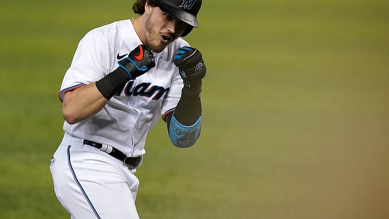 May 4, 2021; Miami, Florida, USA; Miami Marlins third baseman Brian Anderson (15) celebrates his three-run homerun in the 1st inning against the Arizona Diamondbacks at loanDepot park. Mandatory Credit: Jasen Vinlove-USA TODAY Sports