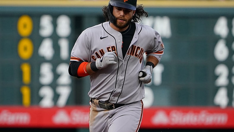 May 4, 2021; Denver, Colorado, USA; San Francisco Giants shortstop Brandon Crawford (35) runs off his two run home run in the sixth inning against the Colorado Rockies at Coors Field. Mandatory Credit: Ron Chenoy-USA TODAY Sports