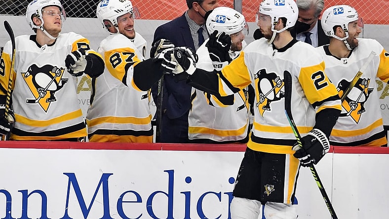 May 4, 2021; Philadelphia, Pennsylvania, USA; Pittsburgh Penguins defenseman Marcus Pettersson (28) celebrates his goal with center Sidney Crosby (87) and left wing Jake Guentzel (59) against the Philadelphia Flyers during the first period at Wells Fargo Center. Mandatory Credit: Eric Hartline-USA TODAY Sports