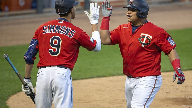 May 4, 2021; Minneapolis, Minnesota, USA; Minnesota Twins first baseman Willians Astudillo (64) celebrates with shortstop Andrelton Simmons (9) after hitting a solo home run in the fifth inning against the Texas Rangers at Target Field. Mandatory Credit: Jesse Johnson-USA TODAY Sports