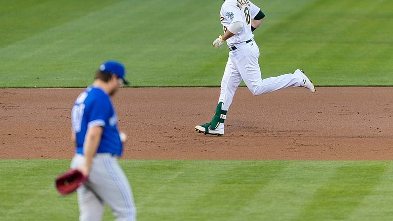 May 4, 2021; Oakland, California, USA; Oakland Athletics designated hitter Mitch Moreland (18) runs the bases after hitting a two-run home run against the Toronto Blue Jays in the second inning at RingCentral Coliseum. Mandatory Credit: John Hefti-USA TODAY Sports