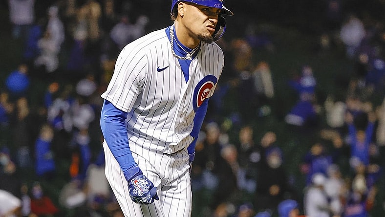 May 4, 2021; Chicago, Illinois, USA; Chicago Cubs shortstop Javier Baez (9) reacts after hitting a two-run home run against the Los Angeles Dodgers during the eight inning of the second game of a doubleheader at Wrigley Field. Mandatory Credit: Kamil Krzaczynski-USA TODAY Sports